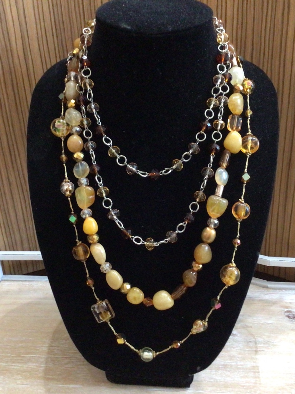 Lot of three glass beaded necklaces. All in great shape earth tones.